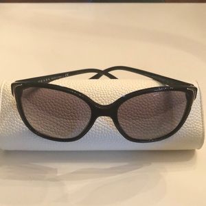 Black and gold accent Prada sunglasses